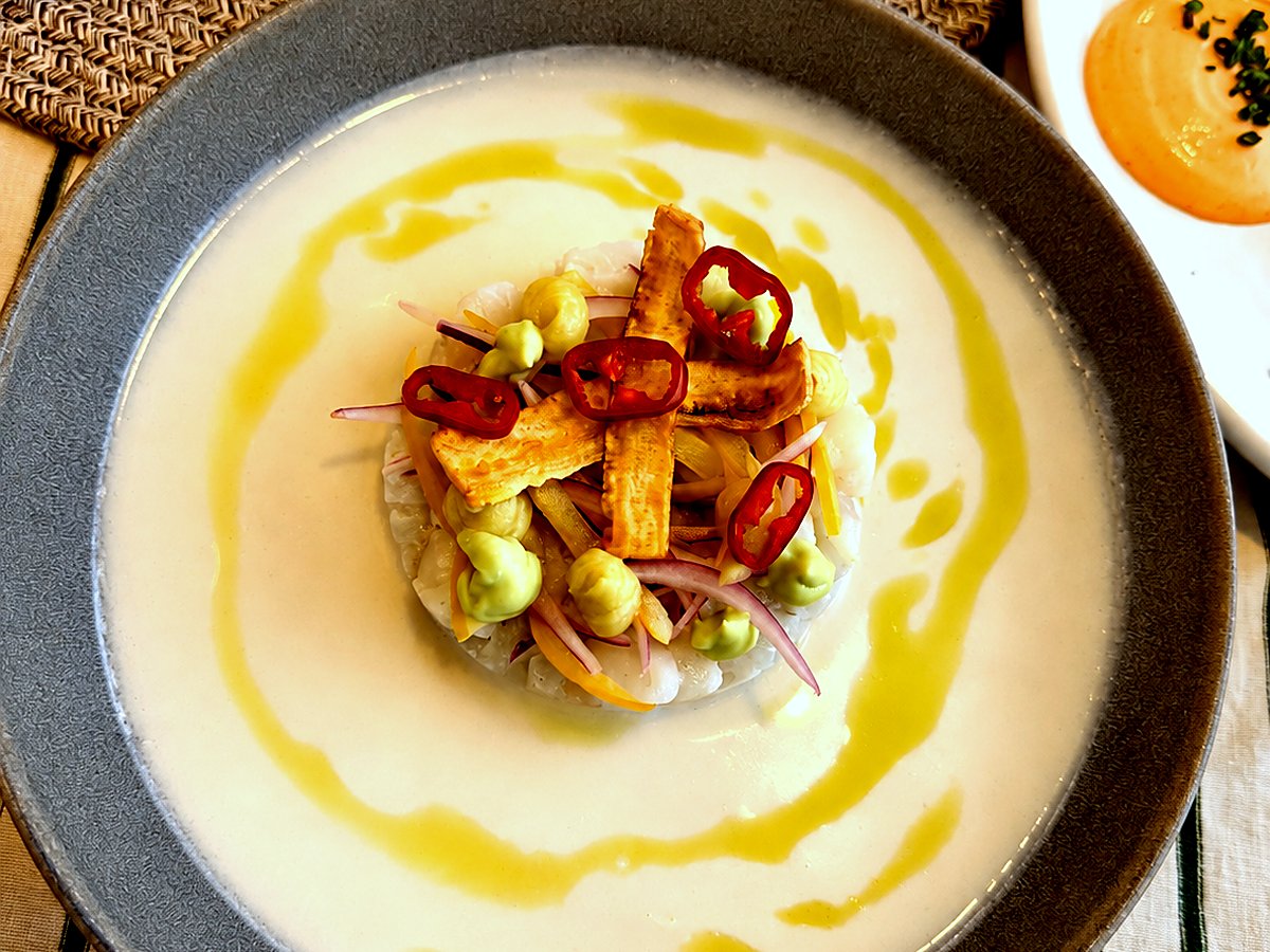 Marinated fish with chilli, avocado and a golden olive oil sauce