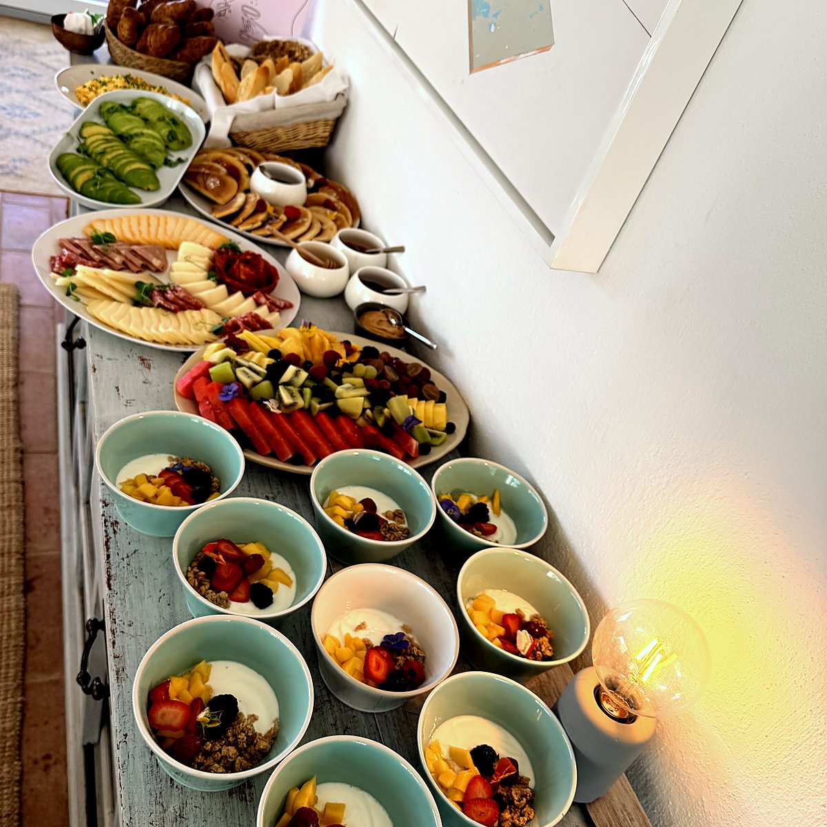 Fruit platters and yoghurt bowls on a brunch table