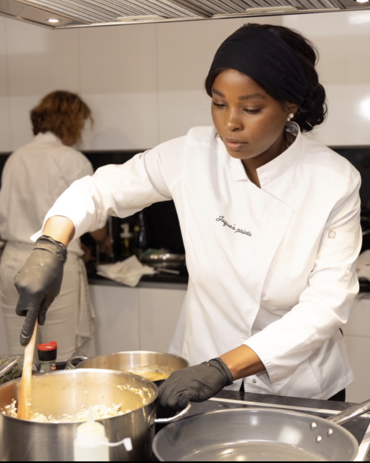 Chefa Jaquelina cooking in a professional kitchen